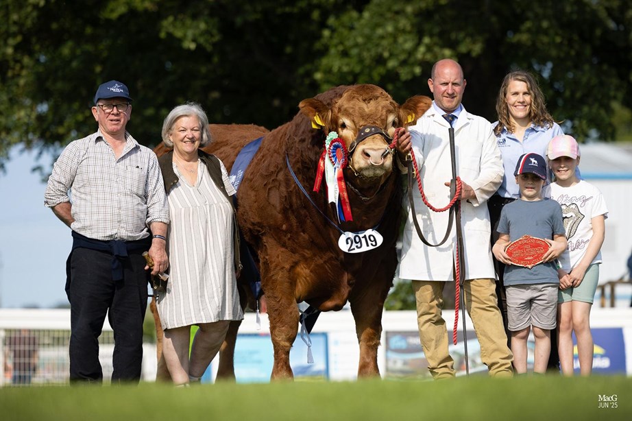 The Irvine family with a prize winning Anside Limousin bull