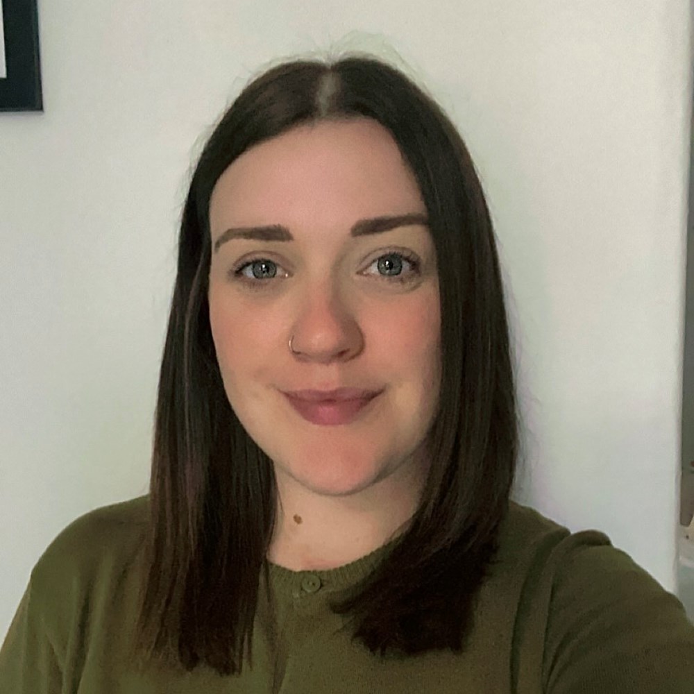 Woman smiling for the camera.