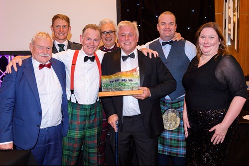 Professor Wayne Powell, left, Professor Mike Coffey, centre, and Professor Eileen Wall, right, collect the Innovation in Farming Award